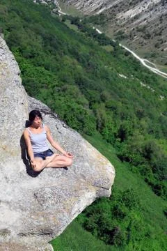 Yoga on the rock Foto stock