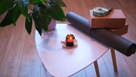 Yoga Studio Accessories Mat Candle Cork Blocks and Stretch Strap Stock Footage 168901591