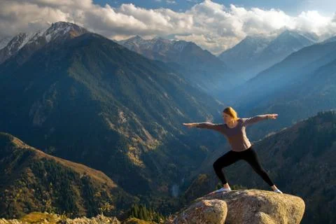 Yoga at summit Stock Photos