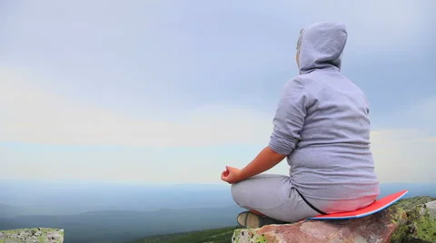 Yoga on top of mountain Stock Footage 42671197