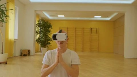 Yoga with VR glasses Stock Footage 117479172