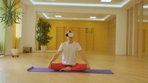 Yoga with VR glasses Stock Footage 117479180