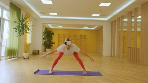 Yoga with VR glasses Stock Footage 117479300