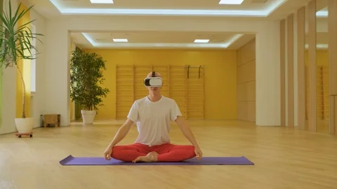 Yoga with VR glasses Stock Footage 117479320
