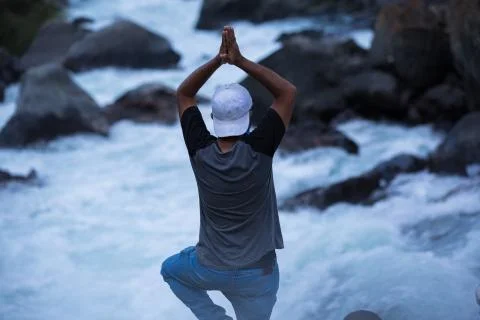 Yoga on waterfall Foto stock