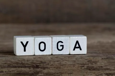 Yoga, written in cubes Stock Photos
