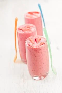 Yoghurt with strawberries Stock Photos