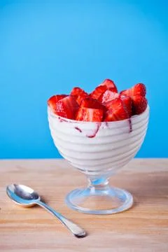 Yoghurt with strawberries Stock Photos
