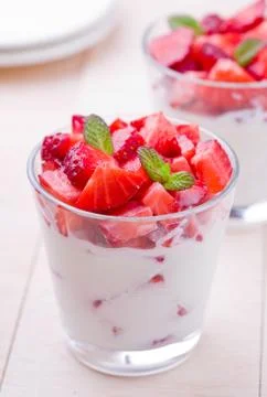 Yoghurt With Strawberries Stock Photos