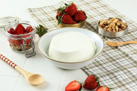 Yoghurt with Strawberry and Cereal, Process Making Parfait. Stock Photos