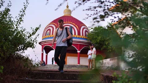 Yogi guy comes from an Indian temple Stock Footage 263531747