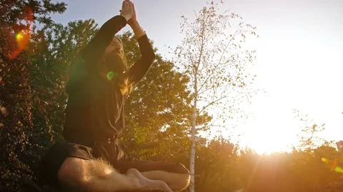 Yogi pray on sunset Stock Footage 81177110