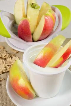 Yogurt with apples Stock Photos