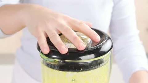 Yogurt being added to mango puree Stock Footage 24657345