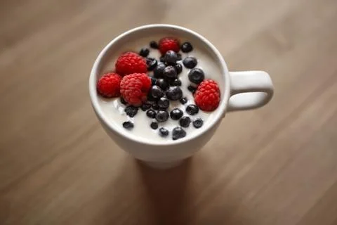 Yogurt with berries Stock Photos