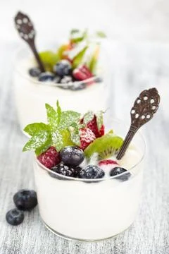 Yogurt with berries. Stock Photos