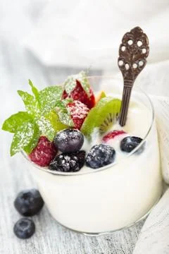 Yogurt with berries. Stock Photos