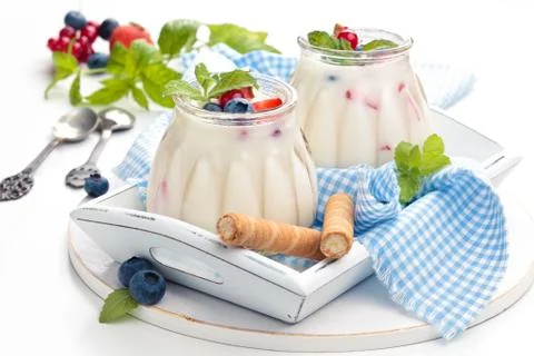 Yogurt with berries. Stock Photos