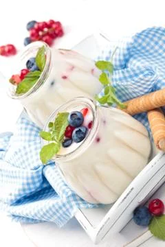 Yogurt with berries. Stock Photos