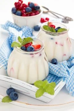 Yogurt with berries. Stock Photos