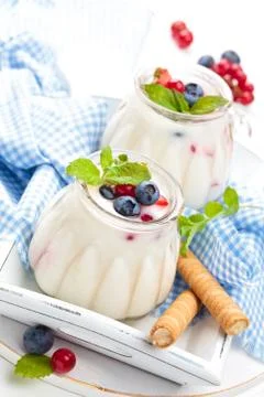 Yogurt with berries. Stock Photos