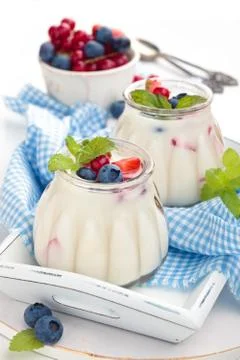 Yogurt with berries. Stock Photos