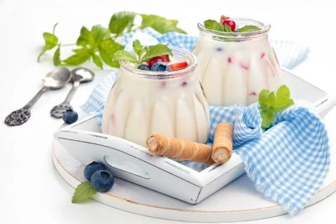 Yogurt with berries. Stock Photos