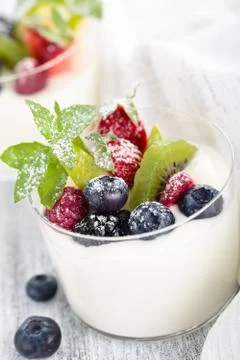 Yogurt with berries. Stock Photos