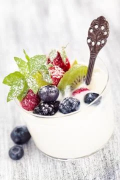 Yogurt with berries. Stock Photos