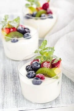 Yogurt with berries. Stock Photos