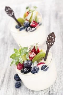 Yogurt with berries. Stock Photos