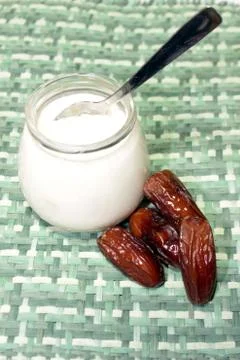 Yogurt with dates Stock Photos