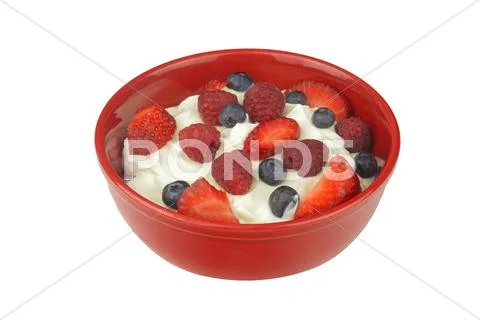 Yogurt with fresh berries isolated Stock Photos
