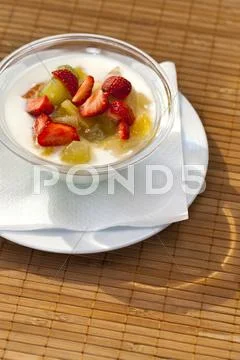 Yogurt with fresh fruits Stock Photos