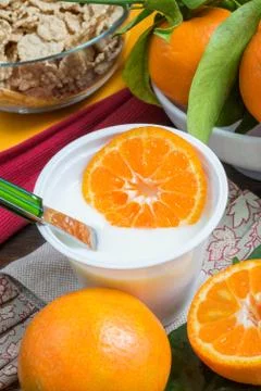 Yogurt with orange Stock-Fotos
