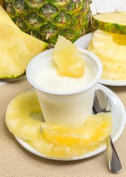 Yogurt with pineapple Stock Photos