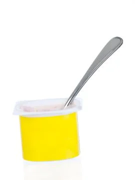 Yogurt pot with spoon Foto stock