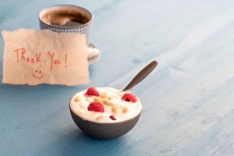 Yogurt with raspberry in a bowl Stock Photos