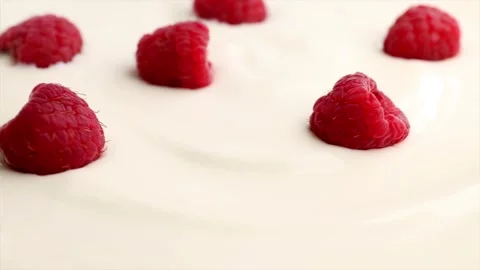Yogurt with raspberry, rotation in circle. background for raspberry-flavored Stock Footage 278906578