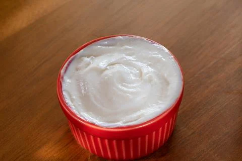 Yogurt in Red Ramekin Foto stock