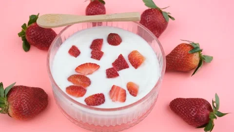 Yogurt strawberry rotate Video stock 236192258