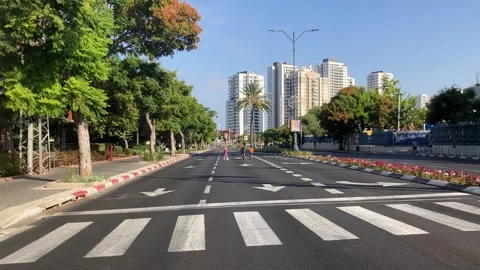 Yom Kippur Empty streets on doomsday. Children ride bicycles Stock Footage 251726075