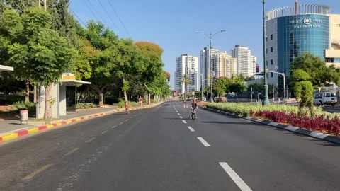 Yom Kippur Empty streets on doomsday. Children ride bicycles Stock Footage 251726076