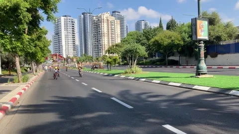 Yom Kippur Empty streets on doomsday. Children ride bicycles Stock Footage 251726078