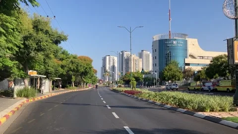 Yom Kippur Empty streets on doomsday. Children ride bicycles Stock Footage 251726080