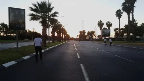 Yom Kippur evening 2016, empty Rokach road, advertisements, people walk on road Видео 80159157