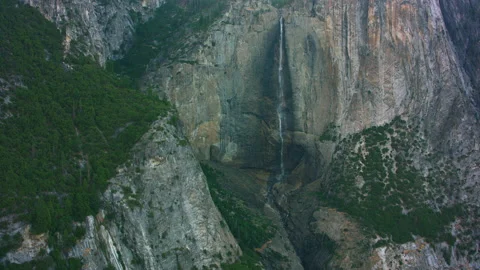 Yosemite, California circa-2021:  Aerial view of waterfall in Yosemite National Stock Footage