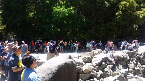 Yosemite Falls Upper and Lower Falls as people view Video stock 91671205