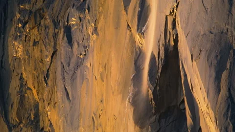 Yosemite Firefall illuminated by sunset light in Yosemite National Park Video stock 245945150