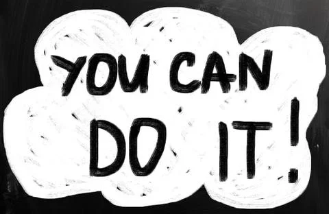 "you can do it" handwritten with white chalk on a blackboard Ilustración de archivo